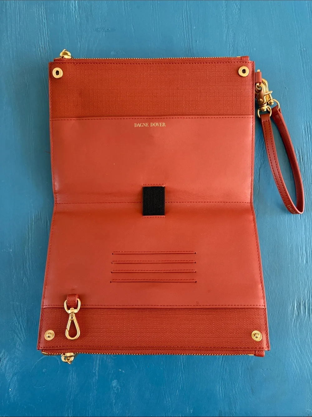Dagne Dover Leather Wristlet Clutch - Rust Orange